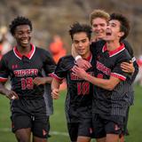 St. Paul's School Photo #8 - Boys soccer celebrating a goal.
