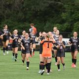 North Yarmouth Academy Photo #17 - NYA Varsity girls Soccer Team celebrating a win a home.