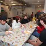 North Yarmouth Academy Photo #10 - A common room in the dormitory where some meals are served. NYA's Director of Dining Services is a 2-time James Beard Award nominee who is dedicated to providing nutritious, delicious meals inspired by the varied cultural backgrounds of our students.